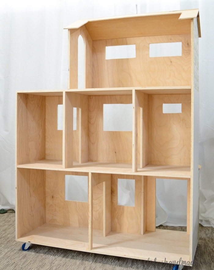Handmade dollhouse made out of plywood. Housefulofhandmade.com