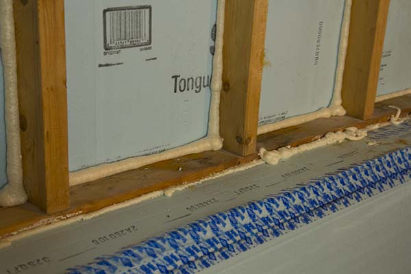 DOW Foam Board Sealed in Stud Bay Cavity with Spray Foam